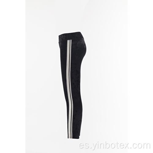 Leggings de terciopelo macizo para mujer.